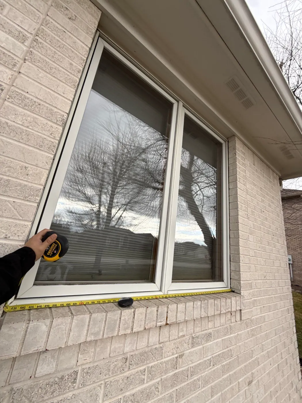 Window replacement documented in Imperial Hills